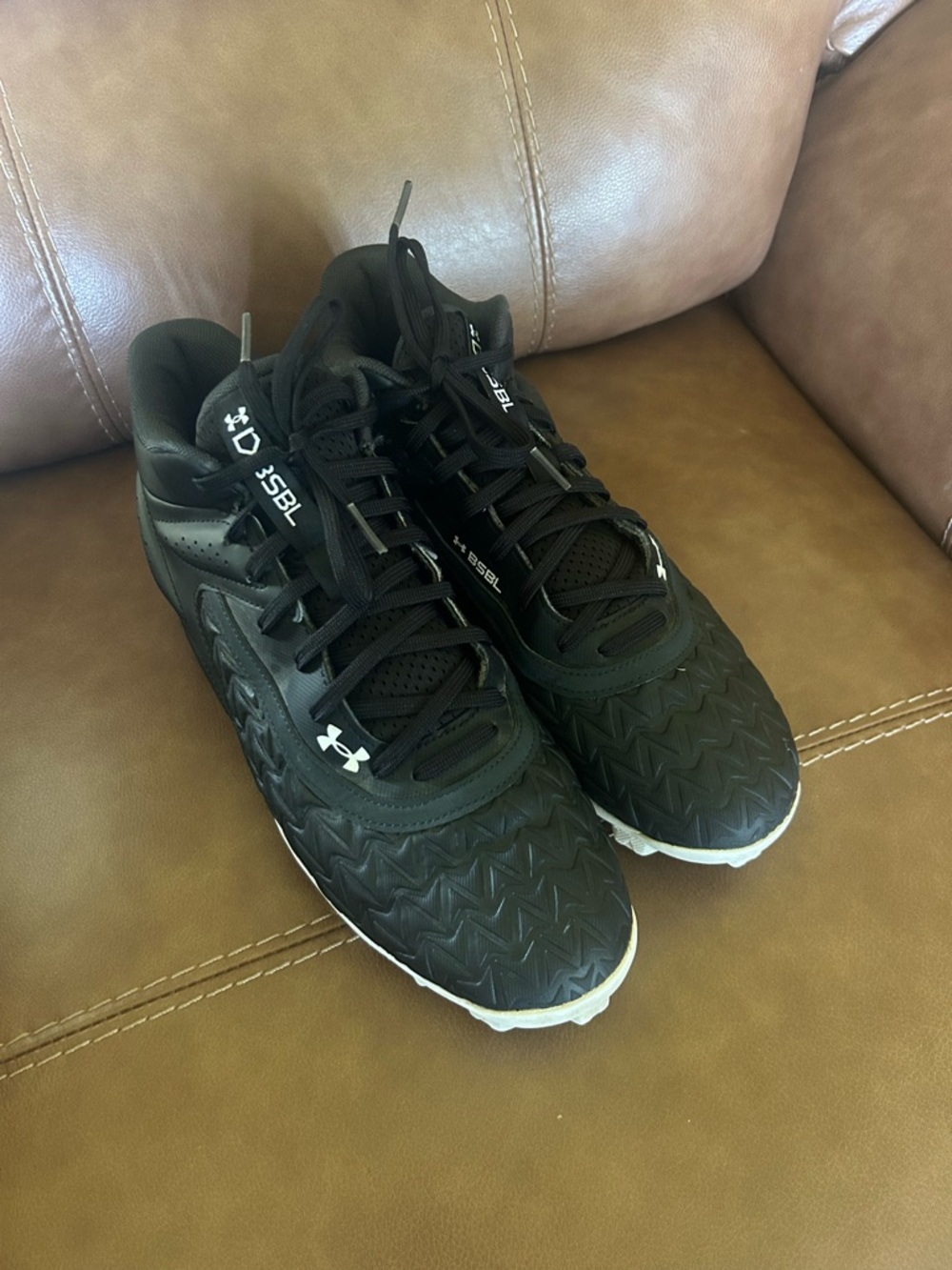 Under Armour Men’s Black Athletic Baseball Cleats Shoes with White Accents